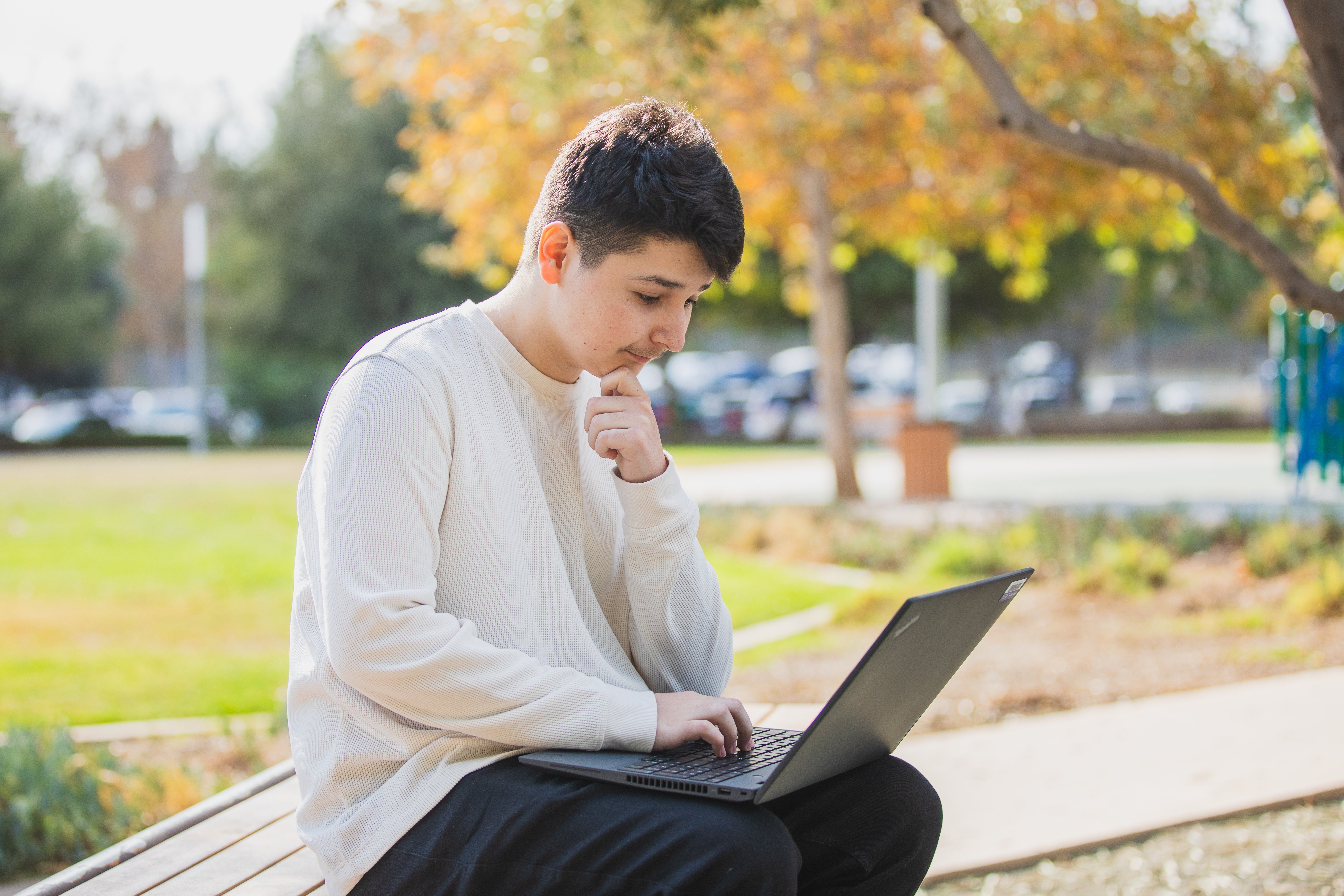 A student working in a classroom.